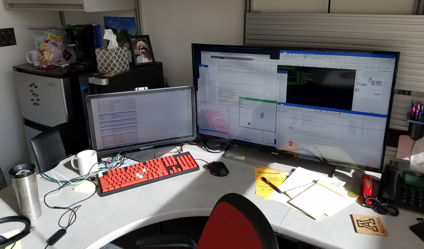 Image that shows a 40" Philips 4k monitor and the rest of my computing setup in MIS in 2016.